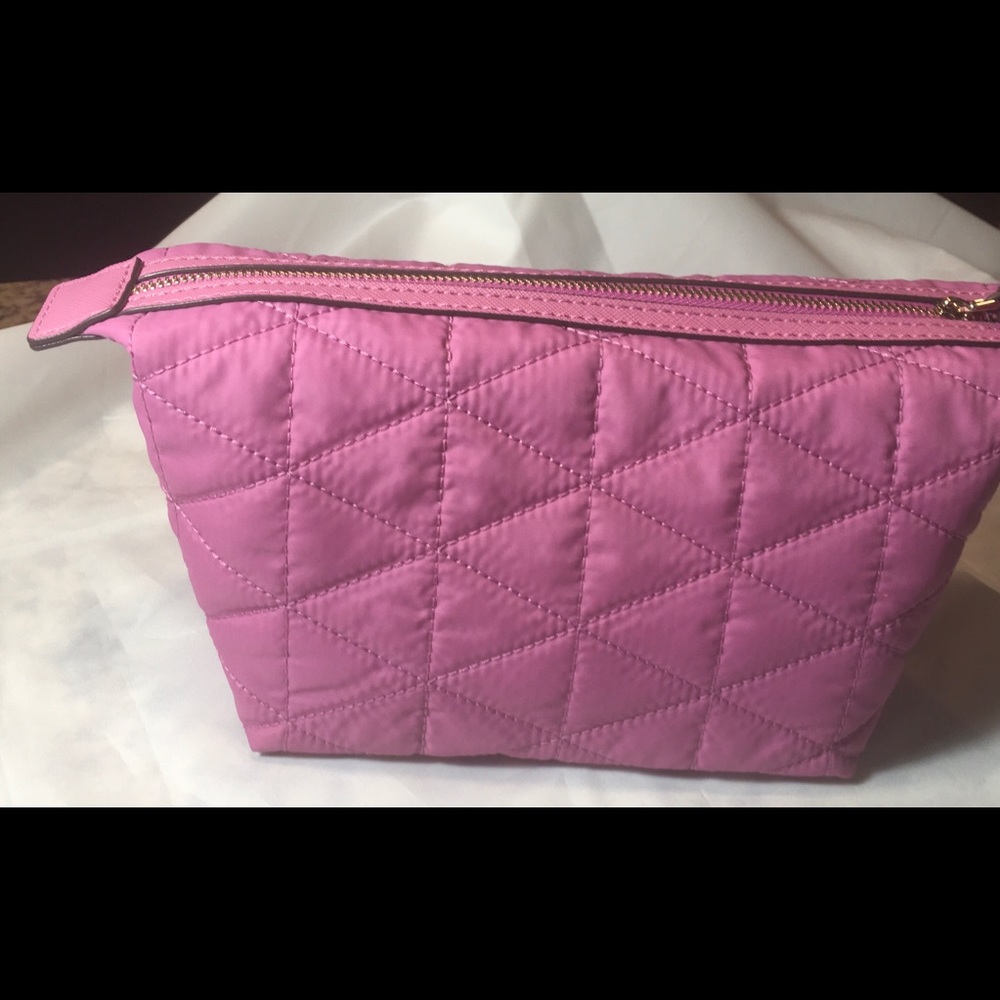 Kate spade cosmetic bag.  Pink. New.